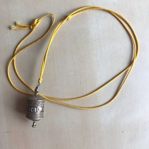 Tibetan Prayer Wheel Pendent In 18” Yellow Cord
